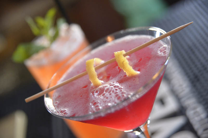 This is a photo of The Federals Signature Pink Cosmopolitan.